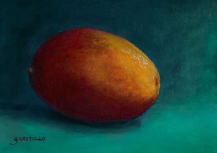 ripe mango on aquamarine